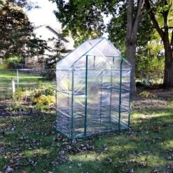 Sunnydaze Decor Sunnydaze Outdoor Portable Tiered Growing Rack Deluxe Walk-In Greenhouse With Roll-Up Door - 4 Shelves - Clear - 54" X 28" X 77" -Sunnydaze Decor Store GUEST 814f7270 00c1 4a5e ad3c b1005f24139f